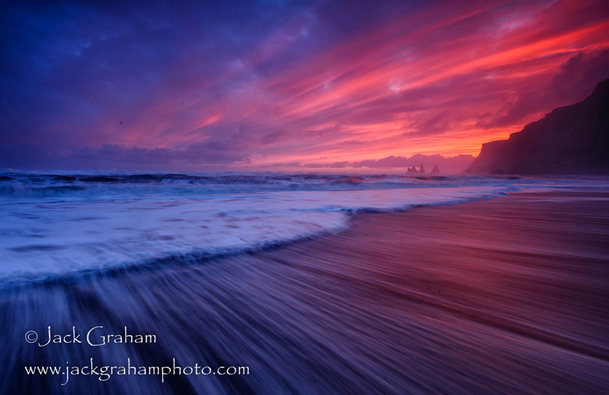 Iceland sunset on beach by jack graham